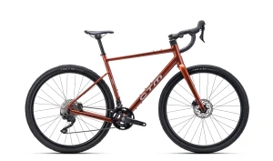 CTM KOYUK 1.0, pneu 28", model 2026, rám M, barva matná cihlová - ZDARMA dopravné, seřízení, odborná montáž a zámek ABUS!