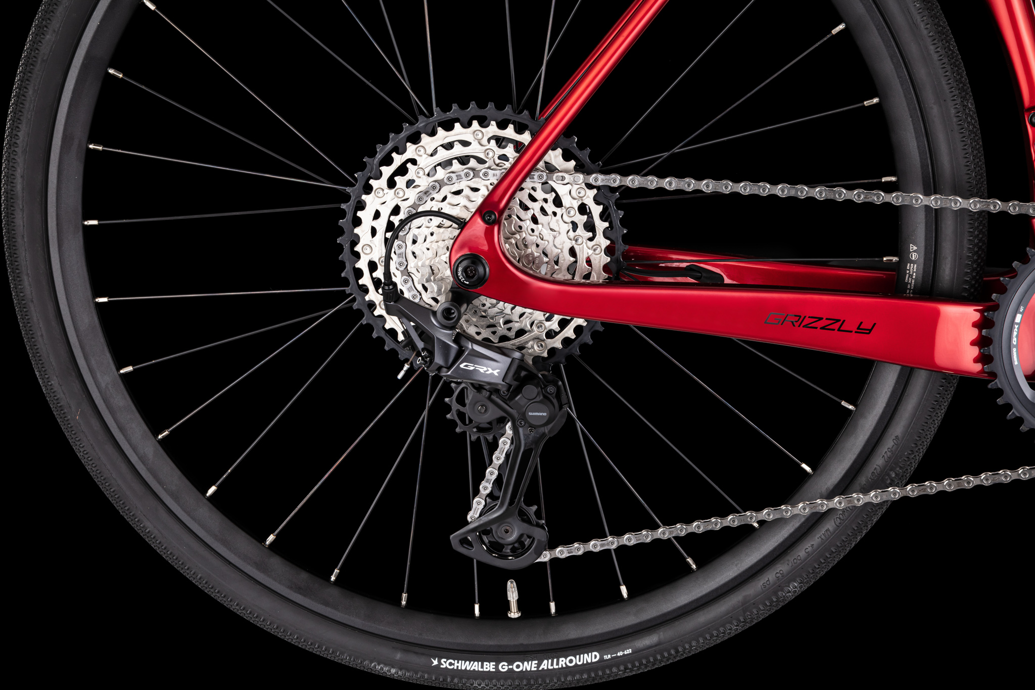 4EVER GRIZZLY ELITE 28", rám 490, model 2026, barva flame red - ZDARMA dopravné, odborná montáž, seřízení, pojištění a dárkový poukaz na nákup příslušensví!