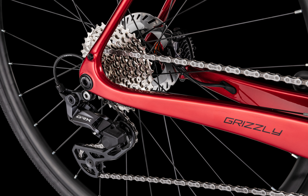 4EVER GRIZZLY RACE 28", rám 540, model 2026, barva flame red - ZDARMA dopravné, odborná montáž, seřízení, pojištění a dárkový poukaz na nákup příslušensví!